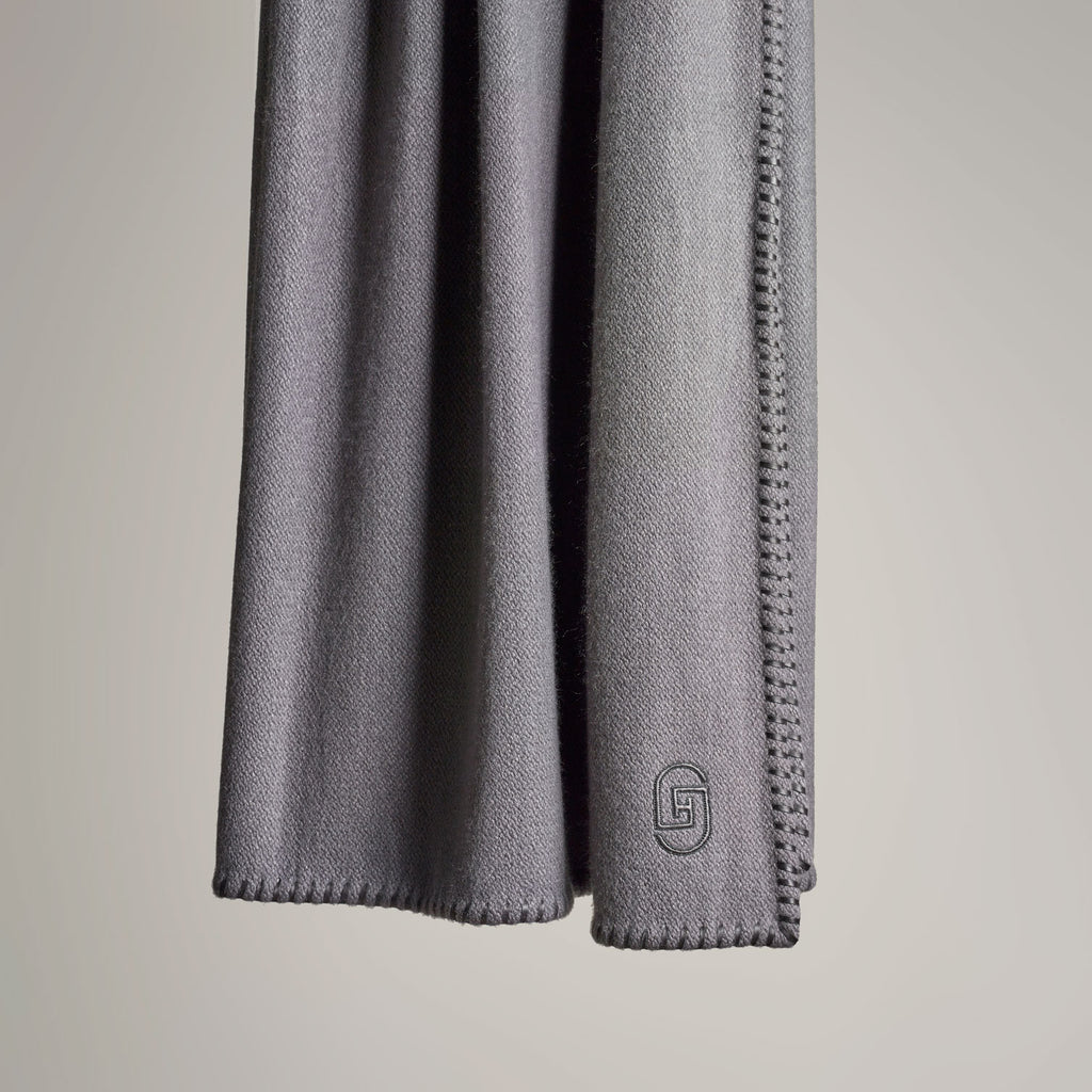 CASHMERE THROW WITH LEATHER DETAIL · STONE
