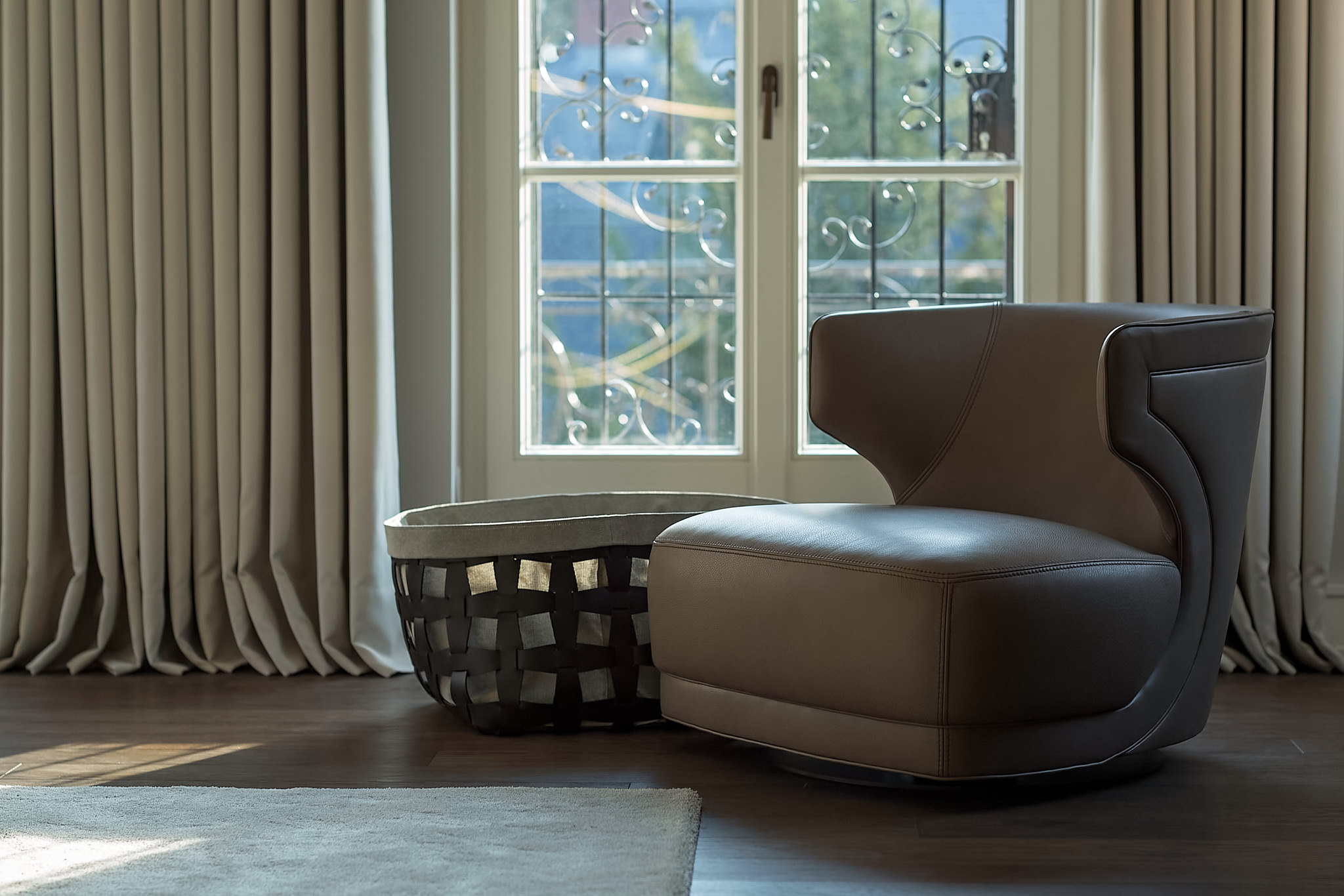 Villa M — Leather armchair window