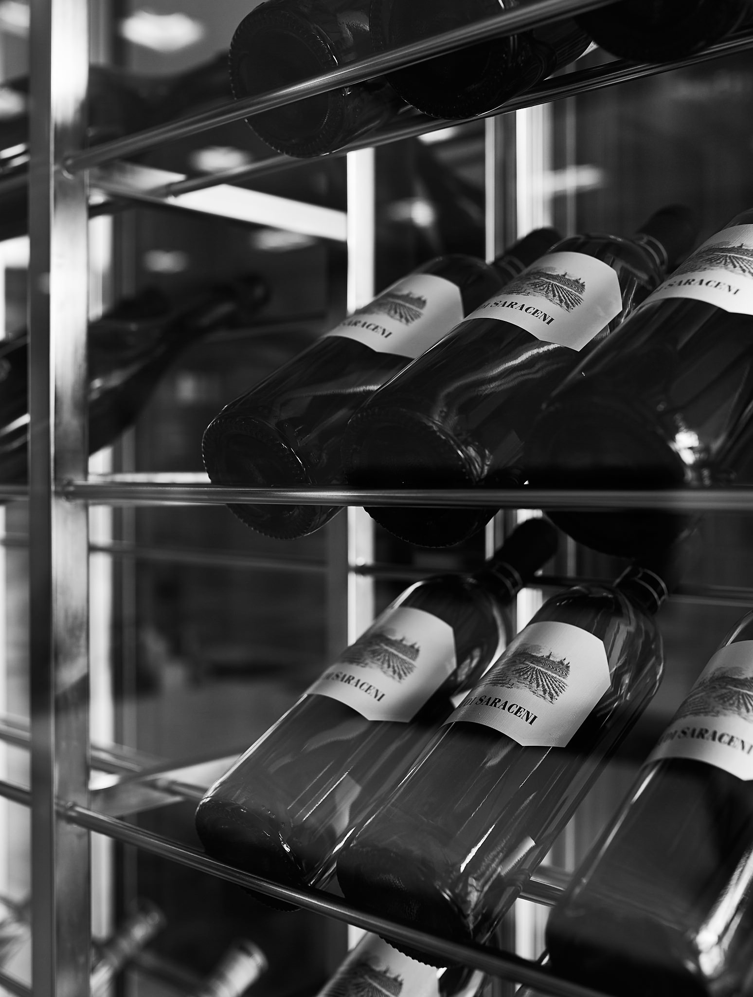 Miro 8 — Wine bottles closeup