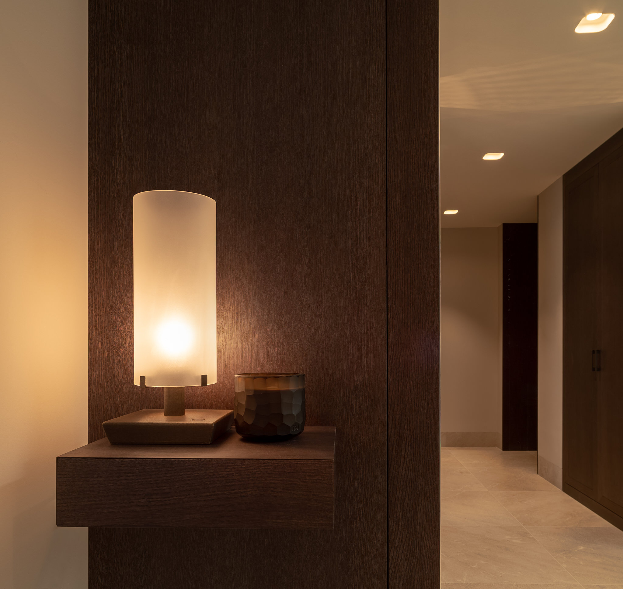 Penthouse CA — Floor lamps stone wall