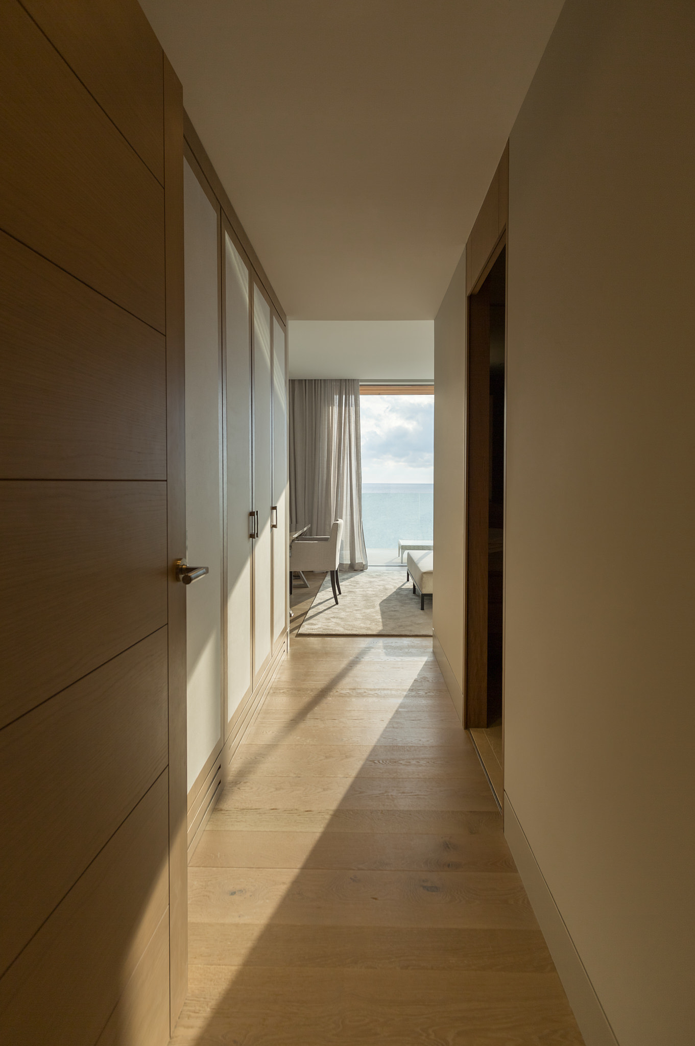 Penthouse CA — Hallway oak sea light