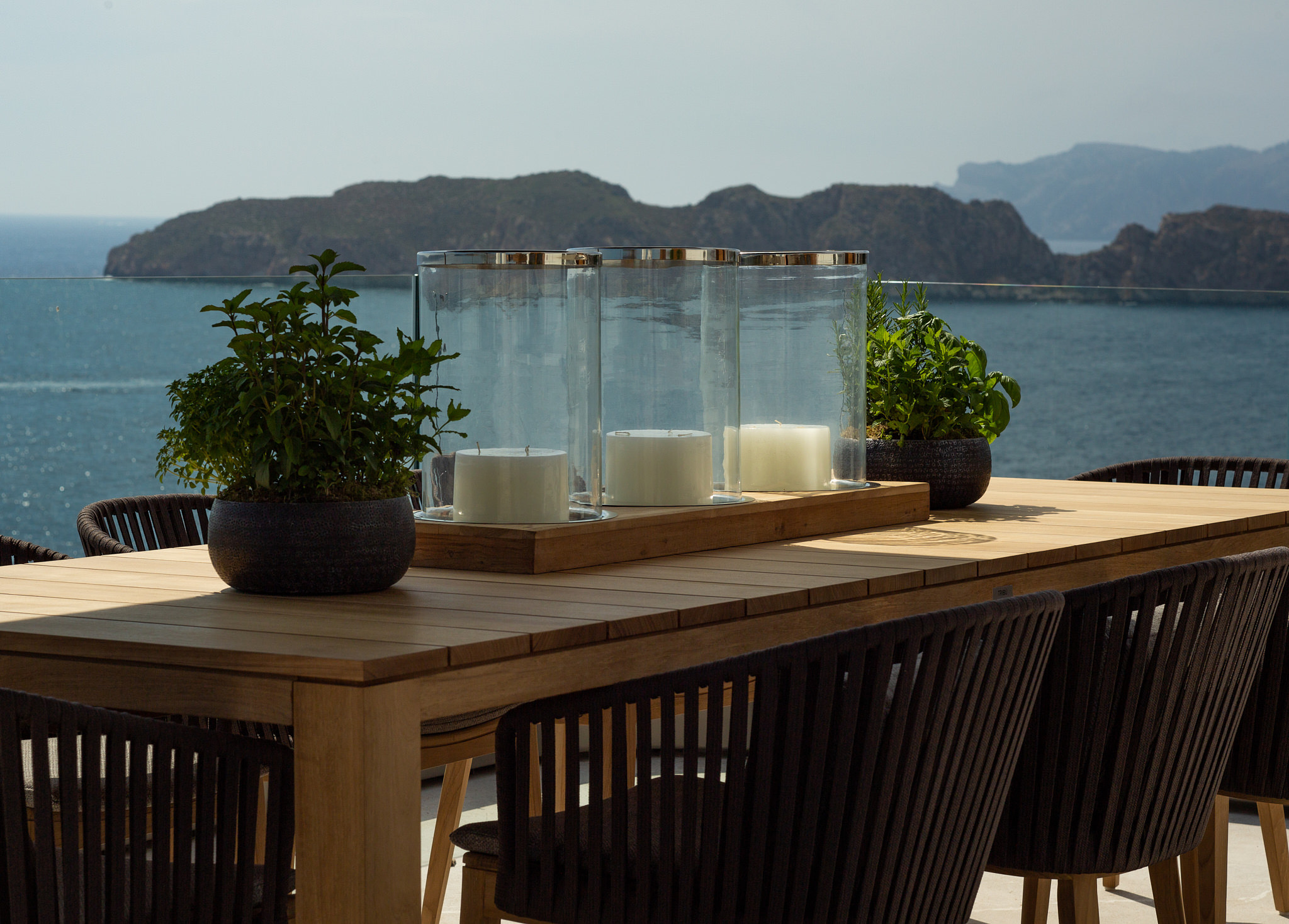 Penthouse CA — Rooftop table candles islands